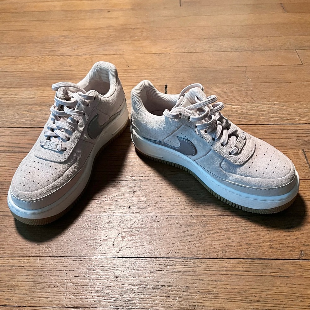 Gray suede Nike Air Force One sneakers